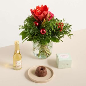 Weihnachtsgruß mit Geburtstagsküchlein und Sekt